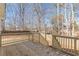 Wooden deck overlooking a wooded backyard at 1990 Old Concord Se Dr, Covington, GA 30016