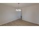 Bright dining room with light flooring and chandelier at 1990 Old Concord Se Dr, Covington, GA 30016