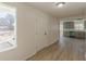 View of the entryway that shows the kitchen and living room at 1990 Old Concord Se Dr, Covington, GA 30016