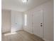 Bright and airy entryway with light wood flooring and an open feel at 1990 Old Concord Se Dr, Covington, GA 30016