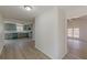 View of the entryway that shows the kitchen and living room at 1990 Old Concord Se Dr, Covington, GA 30016