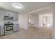 Modern kitchen featuring gray cabinets and stainless steel appliances at 1990 Old Concord Se Dr, Covington, GA 30016