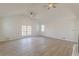 Spacious living room with vaulted ceiling, hardwood floors and fireplace at 1990 Old Concord Se Dr, Covington, GA 30016