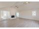 Spacious living room with vaulted ceiling, hardwood floors and fireplace at 1990 Old Concord Se Dr, Covington, GA 30016