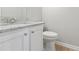 Clean bathroom with granite countertop and white cabinets at 2422 Napa Valley Dr, Villa Rica, GA 30180