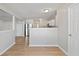 Simple dining room with light grey walls and hardwood floors at 2422 Napa Valley Dr, Villa Rica, GA 30180