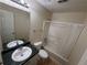 Clean bathroom with tub, shower, and double vanity at 3325 Royal Springs Ct, Decatur, GA 30034