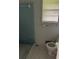 Bathroom with light blue tile and a shower at 1473 Brownleaf Dr, Jonesboro, GA 30236