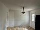 Bright dining room with neutral walls, linoleum flooring, and a classic light fixture at 1473 Brownleaf Dr, Jonesboro, GA 30236