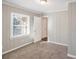 Bright bedroom with neutral walls, carpet, and window coverings at 2077 Rosewood Rd, Decatur, GA 30032