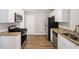 Modern kitchen with granite countertops and stainless steel appliances at 2077 Rosewood Rd, Decatur, GA 30032