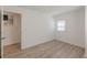 Open bedroom with wood-look floors and an adjacent room at 2649 Santa Barbara Nw Dr, Atlanta, GA 30318
