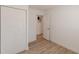 Bright bedroom featuring wood-look floors and a large closet at 2649 Santa Barbara Nw Dr, Atlanta, GA 30318