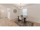 Dining room featuring a table set for four with bright natural lighting at 2649 Santa Barbara Nw Dr, Atlanta, GA 30318