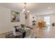 Open-concept living space featuring the dining room, kitchen, and living area at 2649 Santa Barbara Nw Dr, Atlanta, GA 30318
