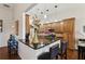 Features a sleek breakfast bar with granite countertops, perfect for casual dining and entertaining at 535 Cape Ivey Dr, Dacula, GA 30019