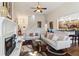 Bright and airy living room with a fireplace, high ceilings, and open layout, perfect for relaxation at 535 Cape Ivey Dr, Dacula, GA 30019