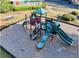 The community playground has a colorful playset with slides and climbing structures for enjoyment at 535 Cape Ivey Dr, Dacula, GA 30019