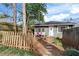 Private backyard with stone path, deck, and wooden fence at 2070 Ridgedale Ne Rd, Atlanta, GA 30317