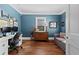 Bright home office with hardwood floors, and built-in shelving at 2070 Ridgedale Ne Rd, Atlanta, GA 30317