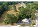 Property view showing building and large lot at 4205 Jim Owens Nw Rd, Kennesaw, GA 30152