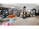 Spacious basement with ample storage and display shelving at 4205 Jim Owens Nw Rd, Kennesaw, GA 30152