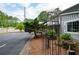 Side view of building with parking and landscaping at 4205 Jim Owens Nw Rd, Kennesaw, GA 30152