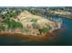 Aerial view of golf course and lakefront property at 724 Landsdowne Ln, Locust Grove, GA 30248