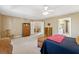 Large Primary bedroom with access to the upper hallway and bath at 724 Landsdowne Ln, Locust Grove, GA 30248