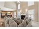 Spacious Gathering room with a fireplace and large sectional sofa at 724 Landsdowne Ln, Locust Grove, GA 30248