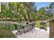 Private backyard with patio and lush trees at 1352 Jennie Sw Ln, Lilburn, GA 30047