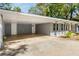 Covered carport and front entrance at 1352 Jennie Sw Ln, Lilburn, GA 30047