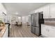 Modern kitchen with stainless steel appliances and granite countertops at 1352 Jennie Sw Ln, Lilburn, GA 30047