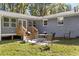 Cozy patio with seating area and gas grill at 1352 Jennie Sw Ln, Lilburn, GA 30047