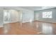 Spacious living area with hardwood floors and access to bathroom at 1415 Eric Se St, Atlanta, GA 30315