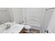 Clean bathroom with bathtub, shower, and updated vanity at 1432 Cutters Mill Dr, Lithonia, GA 30058