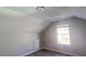Bright bedroom with window and gray walls at 1432 Cutters Mill Dr, Lithonia, GA 30058