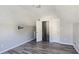 Spacious bedroom with hardwood floors and access to attic at 1432 Cutters Mill Dr, Lithonia, GA 30058