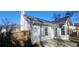 Rear view of house with wooden privacy fence and patio at 1432 Cutters Mill Dr, Lithonia, GA 30058