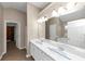 Double vanity bathroom with soaking tub and walk-in shower at 2114 Black Oak Ln, Ellenwood, GA 30294