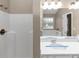 Bathroom with shower, double vanity, and mirror at 2114 Black Oak Ln, Ellenwood, GA 30294
