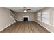 Spacious living room with hardwood floors and a fireplace at 2114 Black Oak Ln, Ellenwood, GA 30294