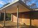 Covered carport attached to the brick house at 2484 Brentwood Rd, Decatur, GA 30032