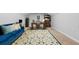 Spacious bonus room with a desk and comfy couch at 2100 Davis Academy Rd, Rutledge, GA 30663