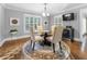 Charming dining room with a round table and seating for four at 2100 Davis Academy Rd, Rutledge, GA 30663