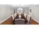 Elegant dining room with hardwood floors and chandelier at 2100 Davis Academy Rd, Rutledge, GA 30663