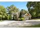 House with a detached garage and side yard at 2100 Davis Academy Rd, Rutledge, GA 30663