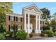 Grand two-story house with columns and landscaping at 2100 Davis Academy Rd, Rutledge, GA 30663