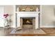 Stone fireplace with white mantel in living room at 2100 Davis Academy Rd, Rutledge, GA 30663