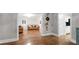 Open living room with hardwood floors and view to kitchen at 2100 Davis Academy Rd, Rutledge, GA 30663